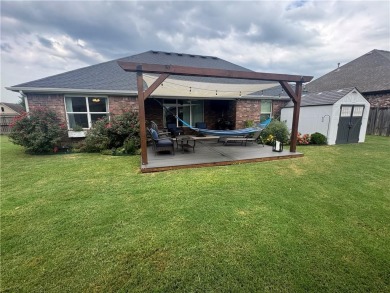 Located in a quiet, family-friendly neighborhood, this home is on Stonebridge Meadows Golf Club in Arkansas - for sale on GolfHomes.com, golf home, golf lot