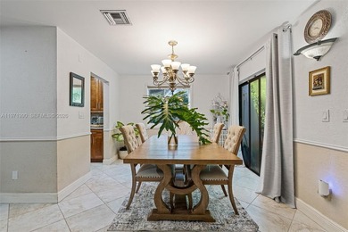 Welcome to your private oasis in the highly sought-after Country on Country Club of Miami in Florida - for sale on GolfHomes.com, golf home, golf lot