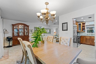 Welcome to your private oasis in the highly sought-after Country on Country Club of Miami in Florida - for sale on GolfHomes.com, golf home, golf lot