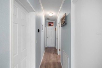 AMAZING VALUE! Fantastic price on this sun-filled, impeccably on Saint Andrews South Golf Club in Florida - for sale on GolfHomes.com, golf home, golf lot