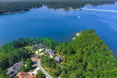 Experience lakefront living at its finest in this beautifully on Monticello Golf Club At Savannah Lakes in South Carolina - for sale on GolfHomes.com, golf home, golf lot