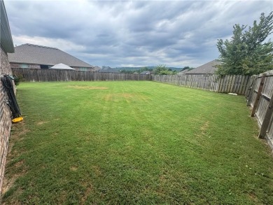 Located in a quiet, family-friendly neighborhood, this home is on Stonebridge Meadows Golf Club in Arkansas - for sale on GolfHomes.com, golf home, golf lot