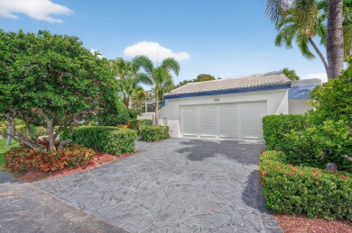 Welcome to your own private retreat in the highly desirable Boca on Bocaire Country Club in Florida - for sale on GolfHomes.com, golf home, golf lot