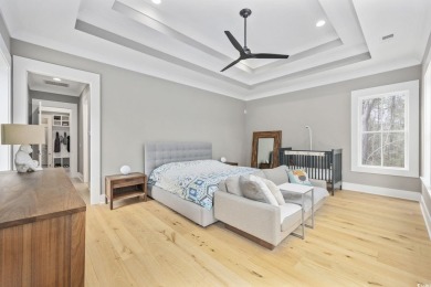 Welcome to this stunning 5-bedroom, 4.5-bath home in the heart on Willbrook Plantation in South Carolina - for sale on GolfHomes.com, golf home, golf lot