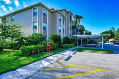 Light and bright 4th floor condo has large windows and lanai on Cedar Hammock Golf and Country Club in Florida - for sale on GolfHomes.com, golf home, golf lot