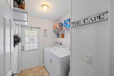 AMAZING VALUE! Fantastic price on this sun-filled, impeccably on Saint Andrews South Golf Club in Florida - for sale on GolfHomes.com, golf home, golf lot