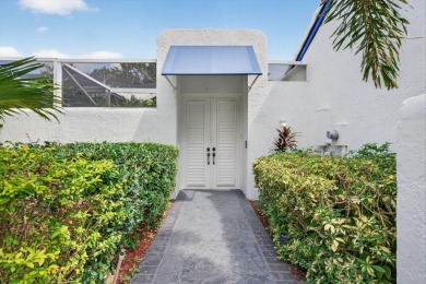 Welcome to your own private retreat in the highly desirable Boca on Bocaire Country Club in Florida - for sale on GolfHomes.com, golf home, golf lot