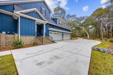 Welcome to this stunning 5-bedroom, 4.5-bath home in the heart on Willbrook Plantation in South Carolina - for sale on GolfHomes.com, golf home, golf lot