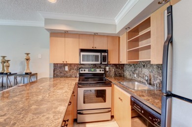 Beautifully updated 1-bedroom, 1-bath condo with direct golf on Seagate Country Club in Florida - for sale on GolfHomes.com, golf home, golf lot