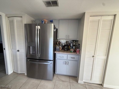Beautiful 2 bedroom 2 bath, home with private views overlooking on Estero Country Club in Florida - for sale on GolfHomes.com, golf home, golf lot