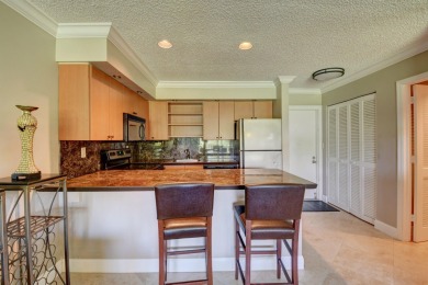 Beautifully updated 1-bedroom, 1-bath condo with direct golf on Seagate Country Club in Florida - for sale on GolfHomes.com, golf home, golf lot