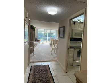 Prime corner 3BD/2BA residence featuring one of the largest on Palm-Aire Country Club and Resort - The Oaks in Florida - for sale on GolfHomes.com, golf home, golf lot