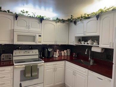 Prime corner 3BD/2BA residence featuring one of the largest on Palm-Aire Country Club and Resort - The Oaks in Florida - for sale on GolfHomes.com, golf home, golf lot