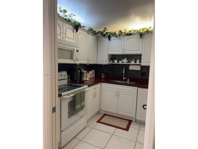 Prime corner 3BD/2BA residence featuring one of the largest on Palm-Aire Country Club and Resort - The Oaks in Florida - for sale on GolfHomes.com, golf home, golf lot