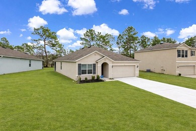 Welcome to this beautifully maintained 3-bedroom, 2-bath home on Lake Diamond Golf and Country Club in Florida - for sale on GolfHomes.com, golf home, golf lot
