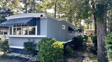 Welcome to Ocean Pines, a friendly 55+ community where neighbors on Indigo Creek Golf Club in South Carolina - for sale on GolfHomes.com, golf home, golf lot