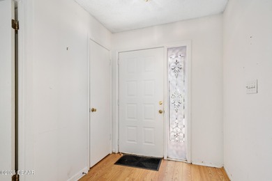 This inviting 3-bedroom, 2-bathroom corner lot home with a on The Club At Pelican Bay - North Course in Florida - for sale on GolfHomes.com, golf home, golf lot