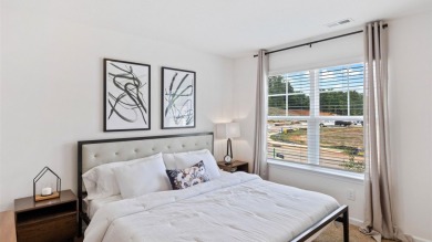 This two-story plan boasts a luxurious primary bedroom upstairs on Shannon Greens Golf Course in South Carolina - for sale on GolfHomes.com, golf home, golf lot