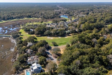 Nestled in the heart of Pawleys Plantation, this private corner on Pawleys Plantation Golf and Country Club in South Carolina - for sale on GolfHomes.com, golf home, golf lot