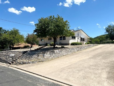 Nicely updated 3/2 brick home perched high for stunning views on Scott Schriener Municipal Golf Course in Texas - for sale on GolfHomes.com, golf home, golf lot