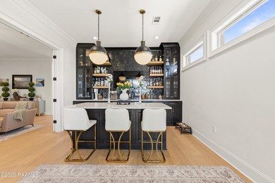 Located in the prestigious gated golf community of Le Triomphe on LeTriomphe Golf and Country Club in Louisiana - for sale on GolfHomes.com, golf home, golf lot