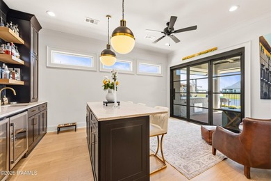 Located in the prestigious gated golf community of Le Triomphe on LeTriomphe Golf and Country Club in Louisiana - for sale on GolfHomes.com, golf home, golf lot