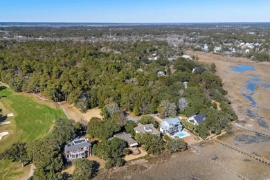 Nestled in the heart of Pawleys Plantation, this private corner on Pawleys Plantation Golf and Country Club in South Carolina - for sale on GolfHomes.com, golf home, golf lot