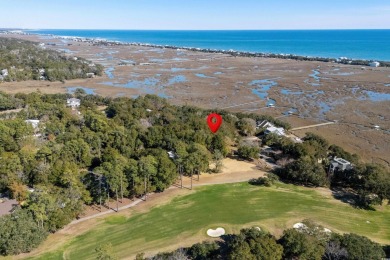 Nestled in the heart of Pawleys Plantation, this private corner on Pawleys Plantation Golf and Country Club in South Carolina - for sale on GolfHomes.com, golf home, golf lot