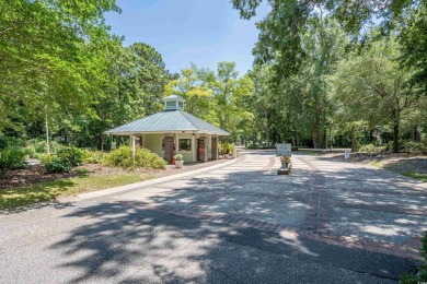 Nestled in the heart of Pawleys Plantation, this private corner on Pawleys Plantation Golf and Country Club in South Carolina - for sale on GolfHomes.com, golf home, golf lot