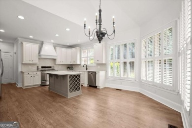 Welcome to this stunning 7-bedroom, 5.5-bathroom home boasting 6 on Bridgemill Golf Club in Georgia - for sale on GolfHomes.com, golf home, golf lot