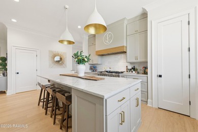 Located in the prestigious gated golf community of Le Triomphe on LeTriomphe Golf and Country Club in Louisiana - for sale on GolfHomes.com, golf home, golf lot