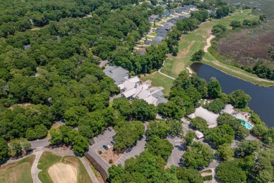 Nestled in the heart of Pawleys Plantation, this private corner on Pawleys Plantation Golf and Country Club in South Carolina - for sale on GolfHomes.com, golf home, golf lot