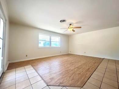 Nicely updated 3/2 brick home perched high for stunning views on Scott Schriener Municipal Golf Course in Texas - for sale on GolfHomes.com, golf home, golf lot