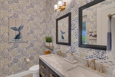 Experience refined living in this 2022 custom-built residence on Indian River Club in Florida - for sale on GolfHomes.com, golf home, golf lot