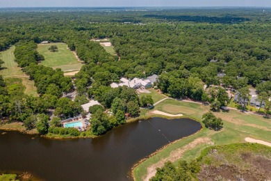 Nestled in the heart of Pawleys Plantation, this private corner on Pawleys Plantation Golf and Country Club in South Carolina - for sale on GolfHomes.com, golf home, golf lot