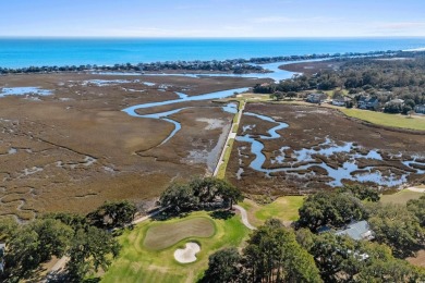 Nestled in the heart of Pawleys Plantation, this private corner on Pawleys Plantation Golf and Country Club in South Carolina - for sale on GolfHomes.com, golf home, golf lot