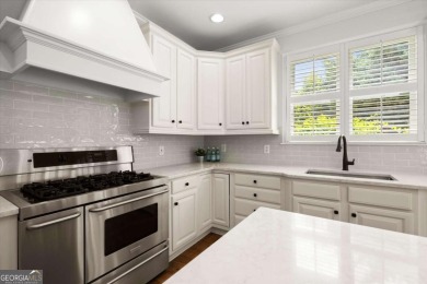 Welcome to this stunning 7-bedroom, 5.5-bathroom home boasting 6 on Bridgemill Golf Club in Georgia - for sale on GolfHomes.com, golf home, golf lot