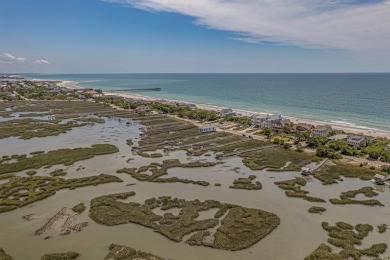 Nestled in the heart of Pawleys Plantation, this private corner on Pawleys Plantation Golf and Country Club in South Carolina - for sale on GolfHomes.com, golf home, golf lot