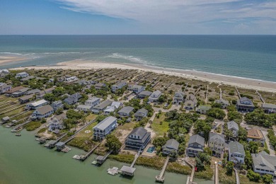 Nestled in the heart of Pawleys Plantation, this private corner on Pawleys Plantation Golf and Country Club in South Carolina - for sale on GolfHomes.com, golf home, golf lot