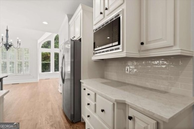 Welcome to this stunning 7-bedroom, 5.5-bathroom home boasting 6 on Bridgemill Golf Club in Georgia - for sale on GolfHomes.com, golf home, golf lot