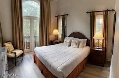 Fully furnished luxury condo with higher vaulted ceilings and on King and Bear Golf Course/World Golf Village in Florida - for sale on GolfHomes.com, golf home, golf lot