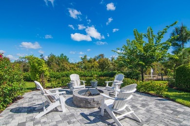 Experience refined living in this 2022 custom-built residence on Indian River Club in Florida - for sale on GolfHomes.com, golf home, golf lot