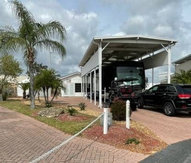Need a great location for a home base?  Located in the luxury on Deer Creek RV Golf Resort in Florida - for sale on GolfHomes.com, golf home, golf lot