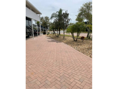 Need a great location for a home base?  Located in the luxury on Deer Creek RV Golf Resort in Florida - for sale on GolfHomes.com, golf home, golf lot