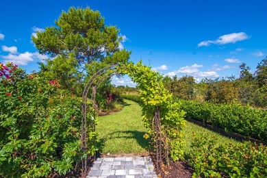 Experience refined living in this 2022 custom-built residence on Indian River Club in Florida - for sale on GolfHomes.com, golf home, golf lot