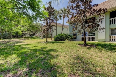 Don't miss this 1 bedroom, 1 bath FIRST FLOOR CORNER UNIT with a on Tarpon Springs Golf Course in Florida - for sale on GolfHomes.com, golf home, golf lot
