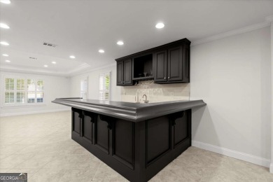 Welcome to this stunning 7-bedroom, 5.5-bathroom home boasting 6 on Bridgemill Golf Club in Georgia - for sale on GolfHomes.com, golf home, golf lot