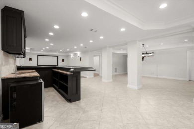 Welcome to this stunning 7-bedroom, 5.5-bathroom home boasting 6 on Bridgemill Golf Club in Georgia - for sale on GolfHomes.com, golf home, golf lot