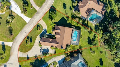 This Plantation Bay 4 bed, 4 bath, 3 car garage pool home is on Plantation Bay Golf and Country Club in Florida - for sale on GolfHomes.com, golf home, golf lot