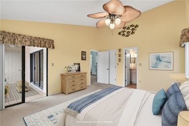 Charming 2BR/2BA condo w/ beautiful lake & golf views, soaring on Pelican Pointe 9 Hole Course in Florida - for sale on GolfHomes.com, golf home, golf lot